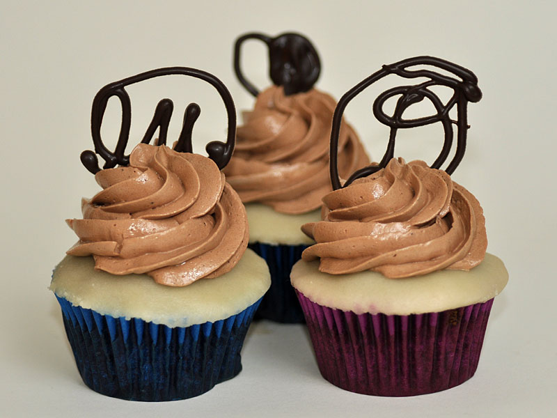 Chocolate - almond topped with marzipan, chocolate buttercream, and a chocolate candy swirl<br>October 5