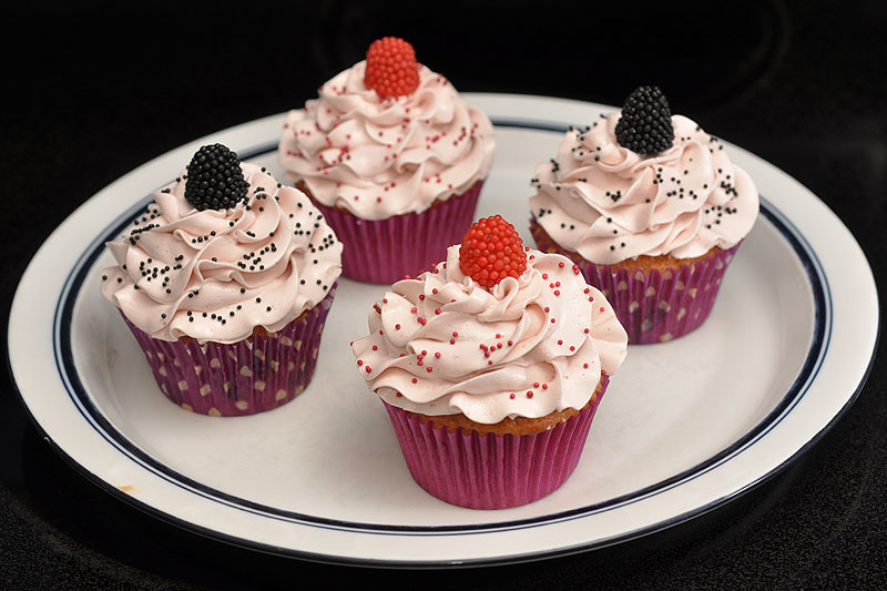 Raspberry, some with raspberry chocolate chips, with raspberry filling and frosting <i>(gf)</i><br>June 9